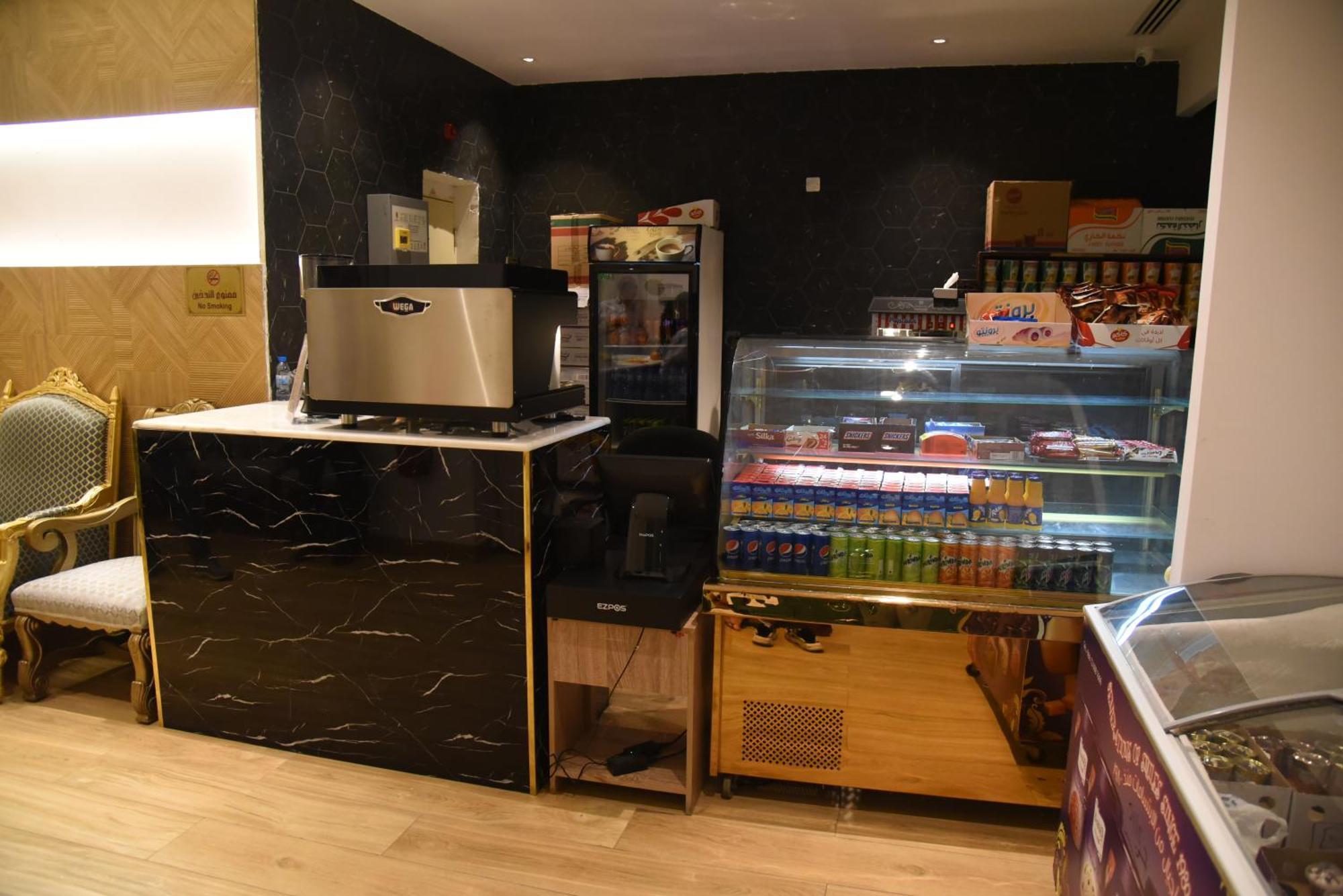 Roya Al Andalus Hotel Medina Exterior photo A coffee machine in a hotel